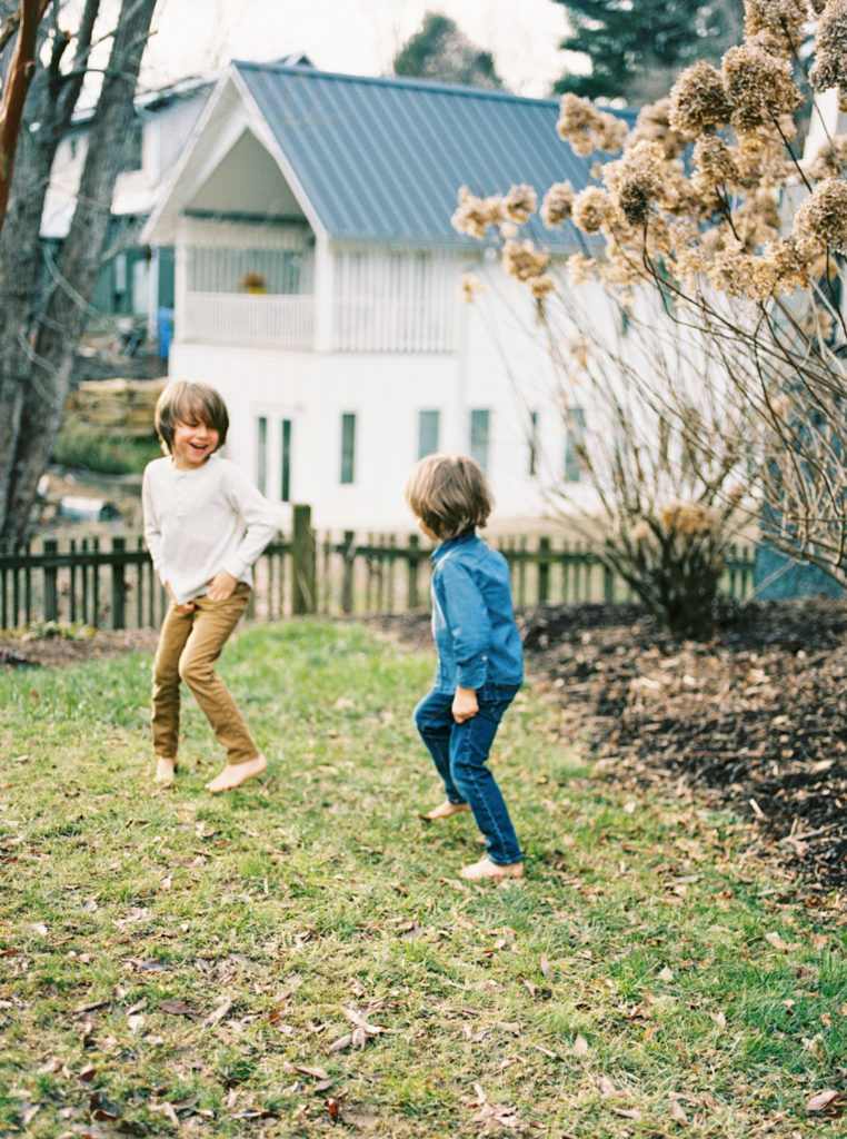 brothers-playing-in-asheville-garden