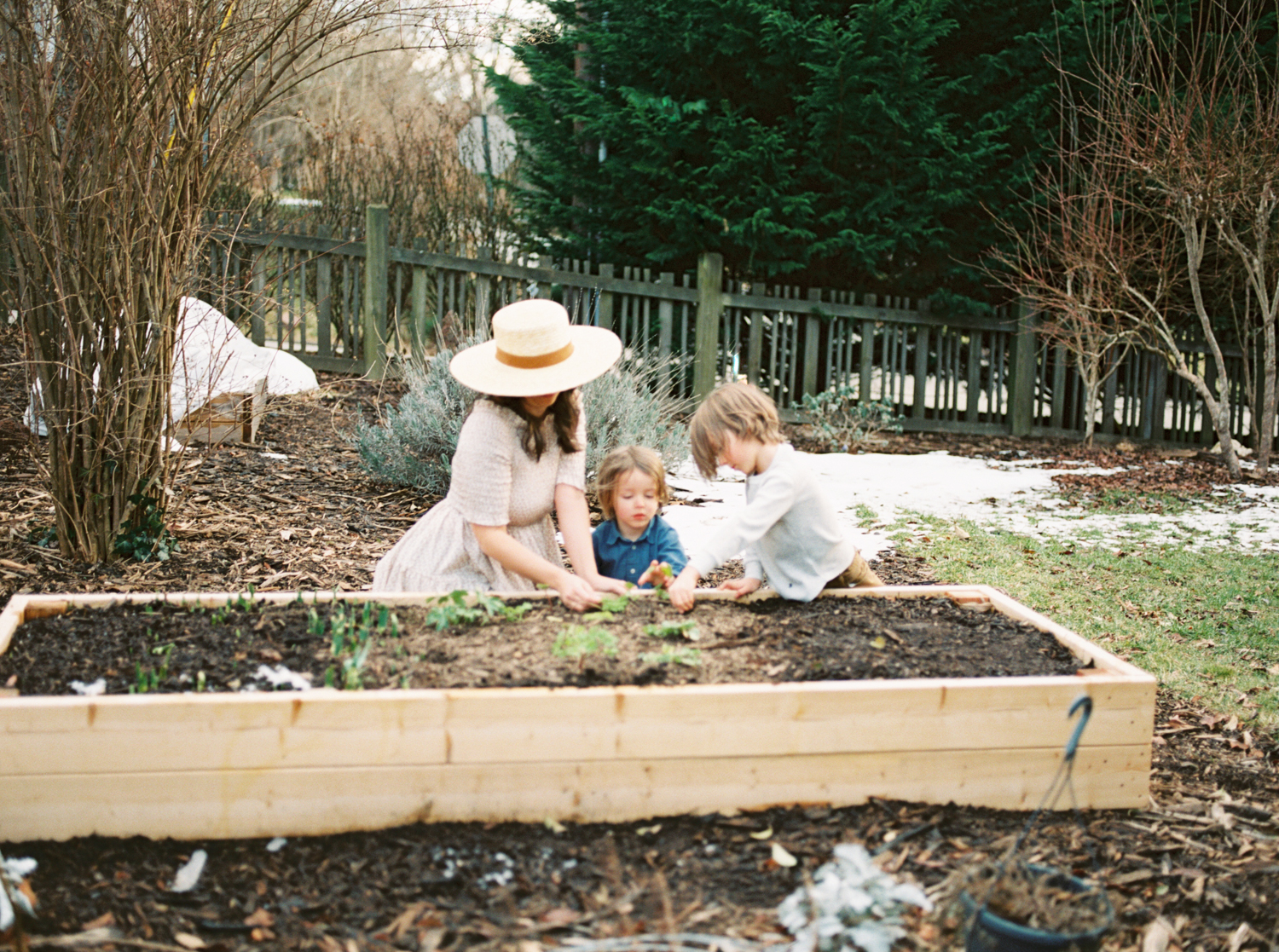asheville-mom-gardening-with-her-boys